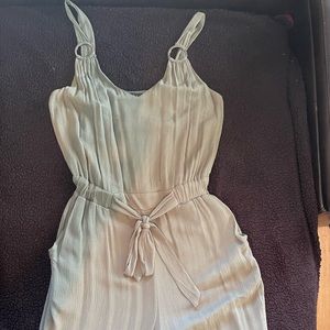 NWT Derek Heart green jumpsuit or romper. Never worn SZm